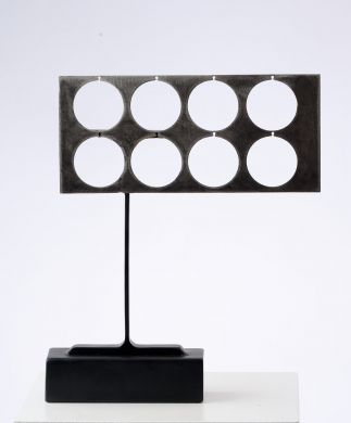 Octo Foramina L  (Eight Holes)